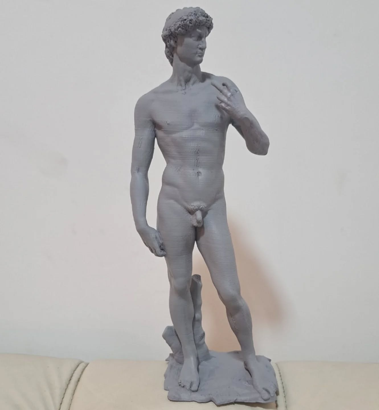 David de Michelangelo - considerada uma das estátuas mais perfeitas do mundo em sua versão impressa em 3d em miniatura.